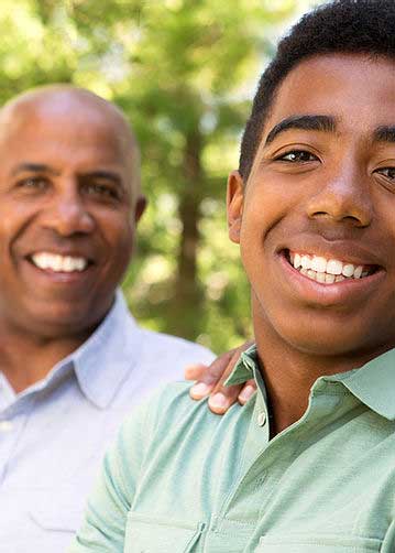 THRU Project provides volunteer mentors to youth who exit foster care young man with older male mentor