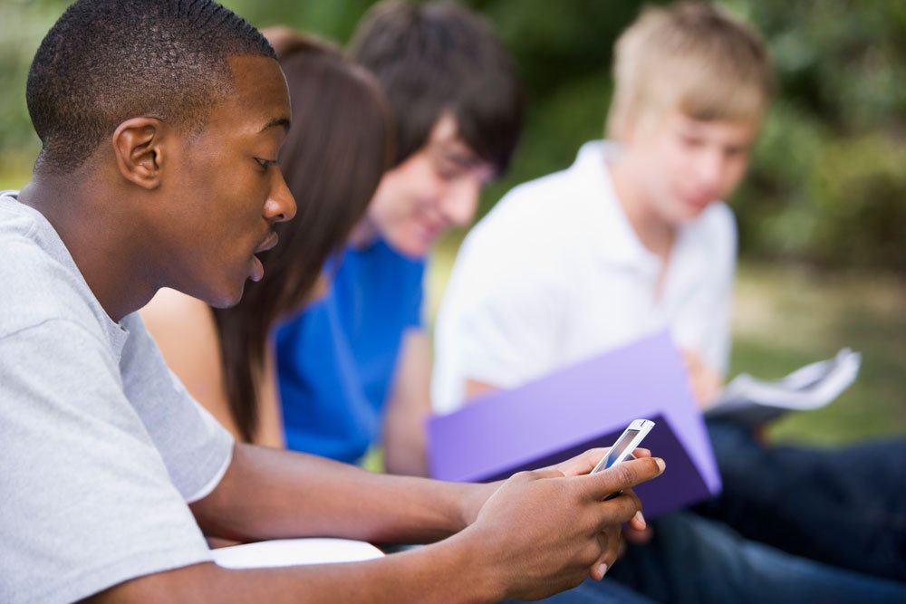 Free Cell Phone Program for Youth Aging Out Foster Care college student text messaging